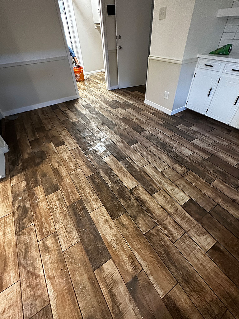 Cheyne-Flooring-5 New flooring installation after water damage – living room view”