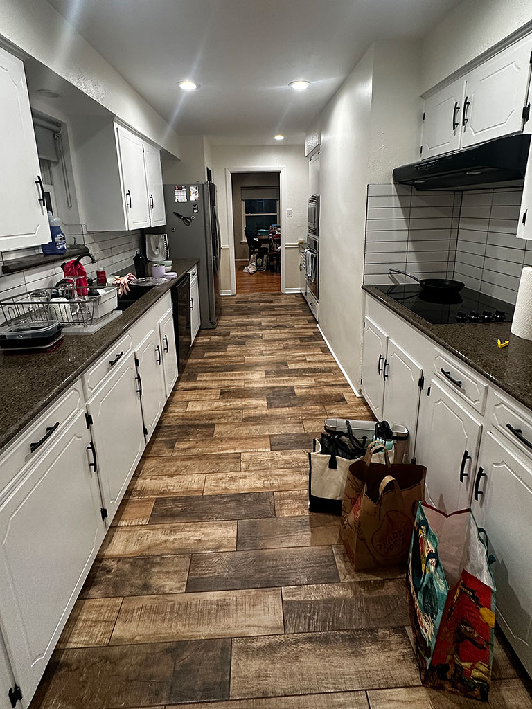 Cheyne-Flooring-7 Water-damaged home with new floors throughout