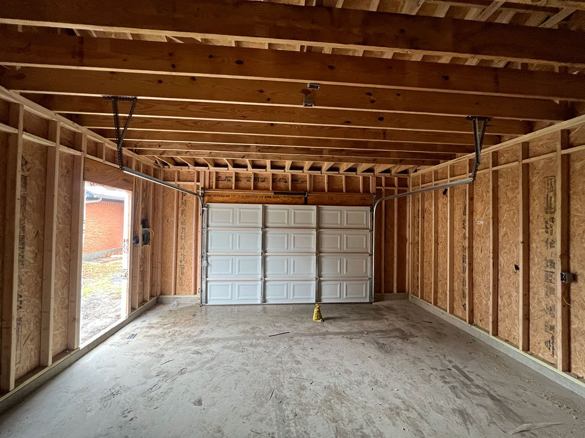 Walker-Garage-4 Completed garage rebuild in Richardson TX with new siding, roof, and garage doors by Old South Construction.